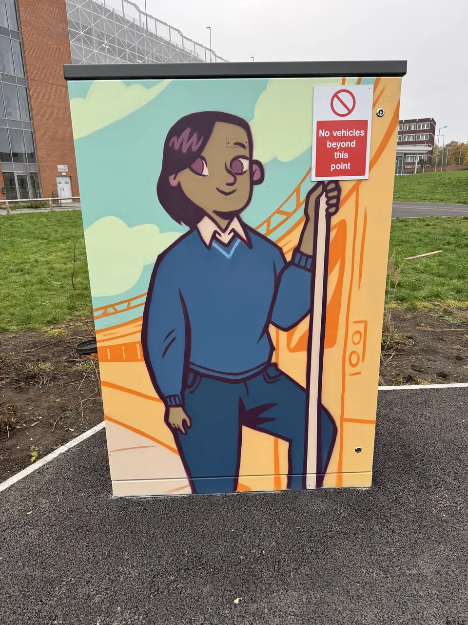 Painted utility cabinet: an illustrated railway worker in a blue jumper leans on a pole beneath orange bridge girders.